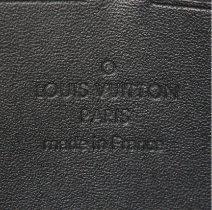 Portafogli Louis Vuitton Zippy in tela monogram cerata color crema con motivo